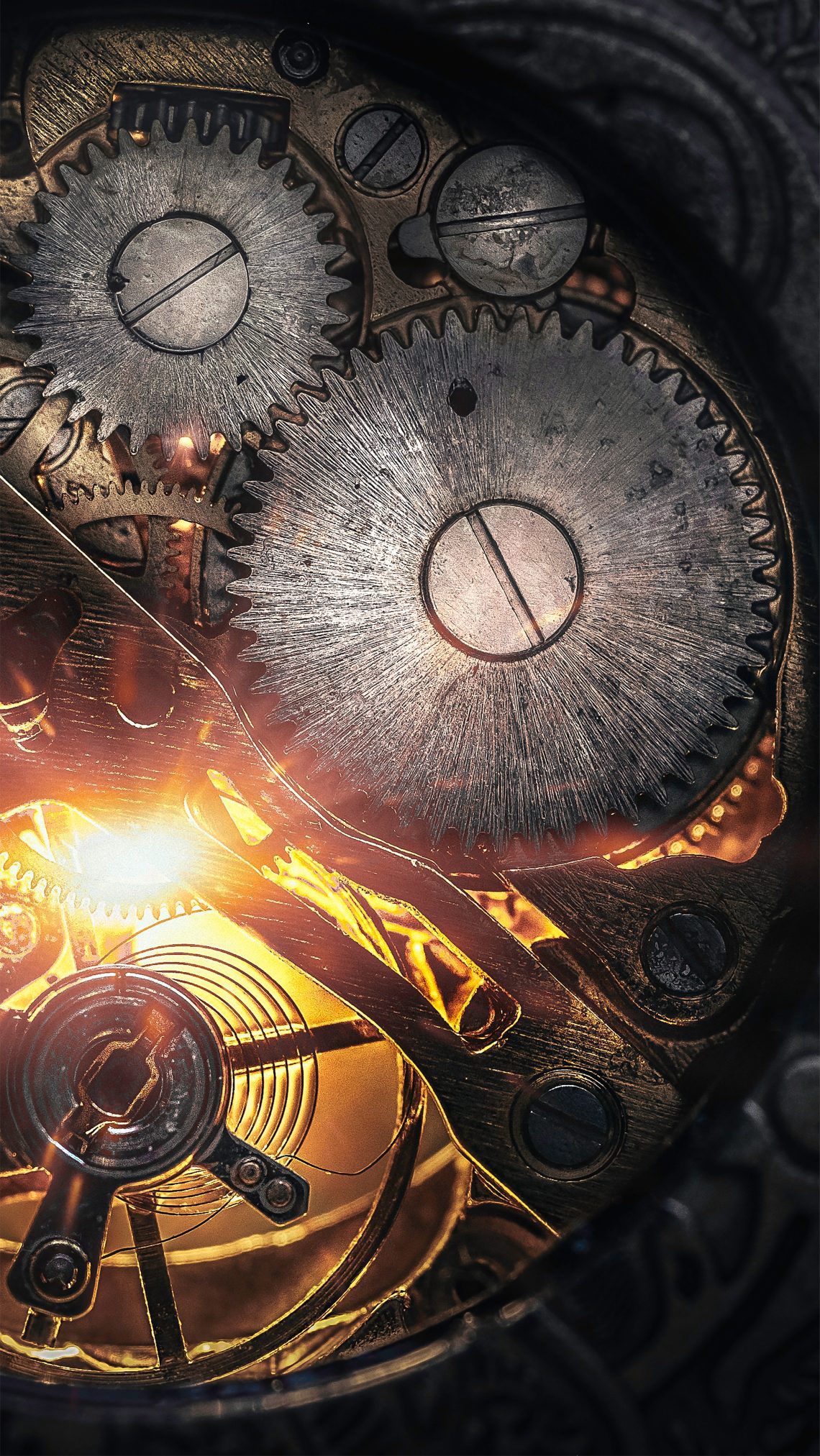 Stunning steampunk clockwork backlit with a golden light.